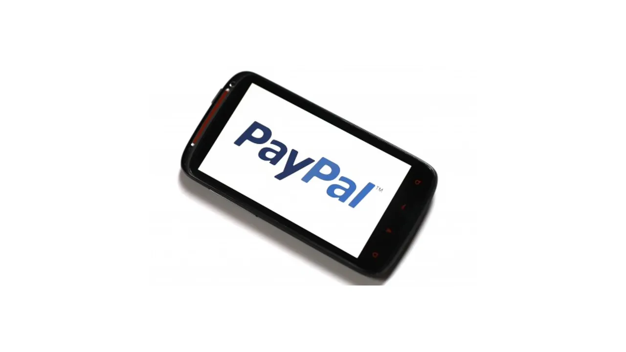 PayPal logo on the screen of a black smartphone photographed against a white background